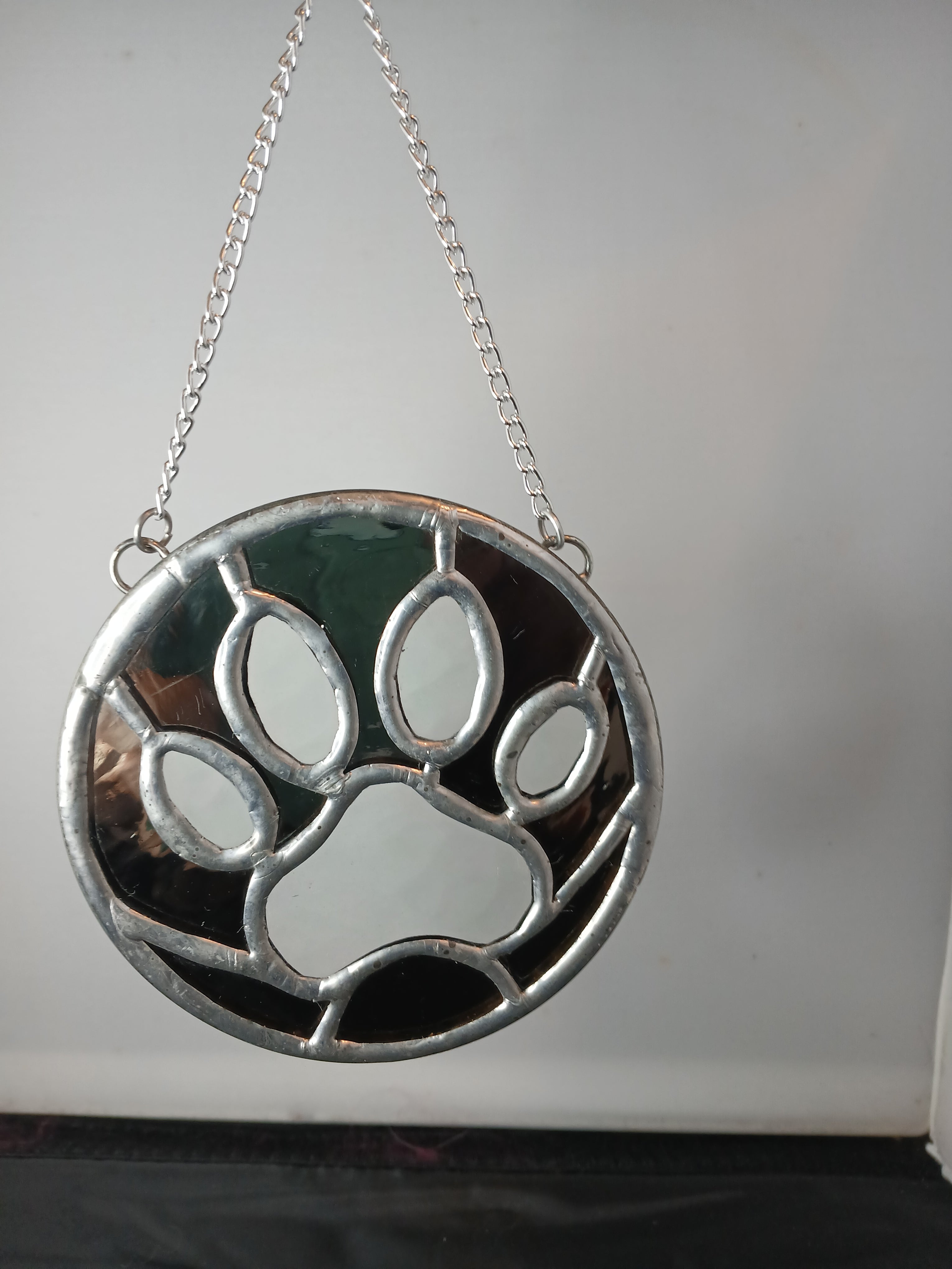 Dog Paw Ornament (clear iridescent and black)