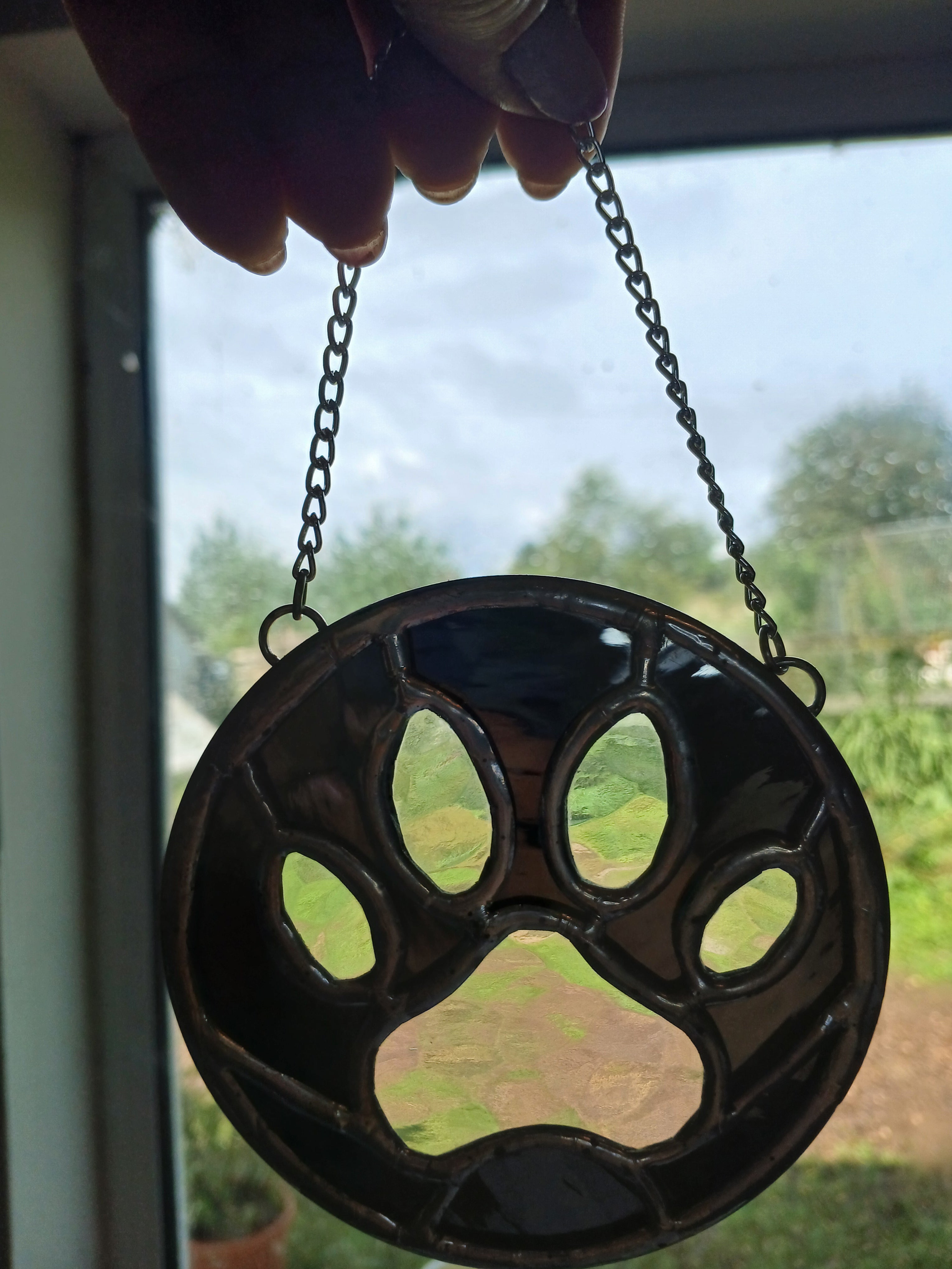 Dog Paw Ornament (clear iridescent and black)