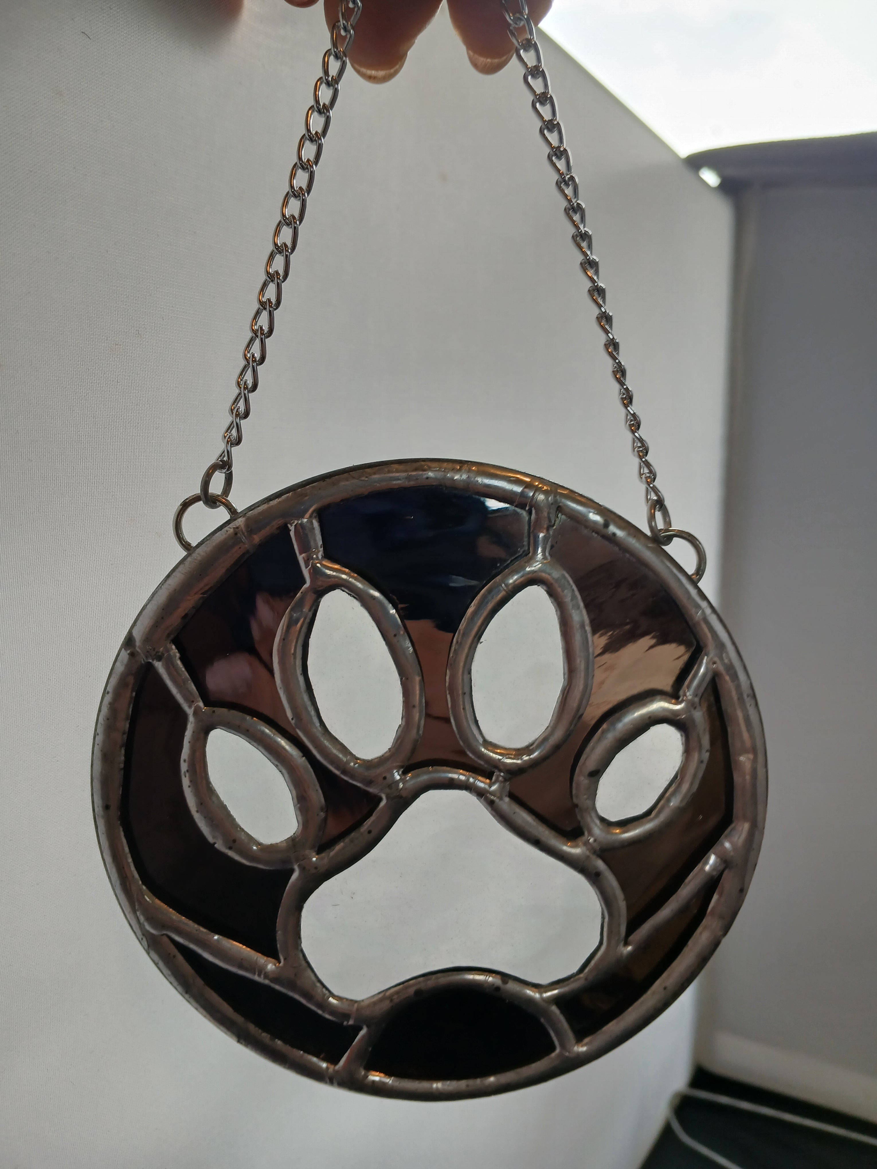 Dog Paw Ornament (clear iridescent and black)