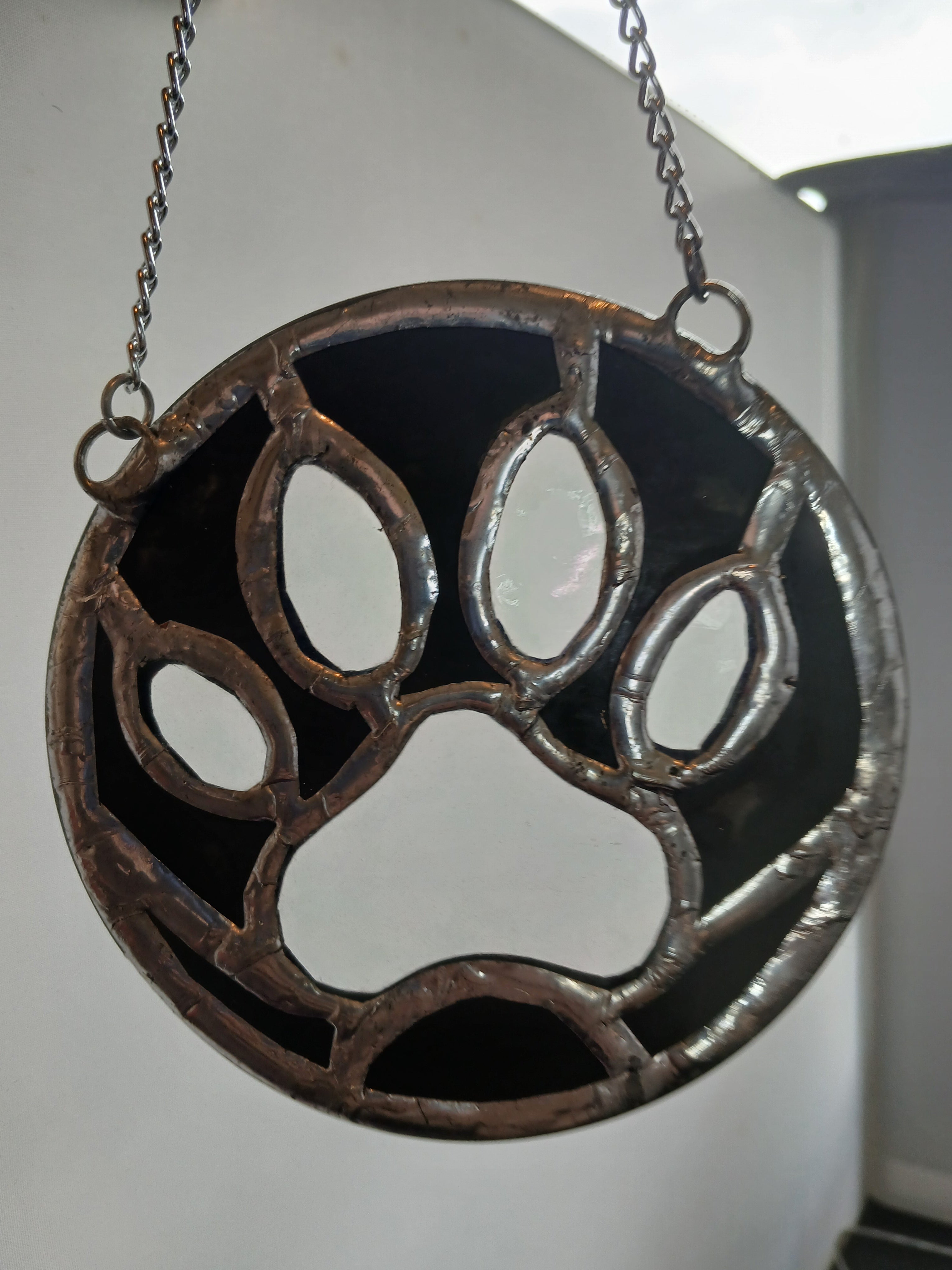 Dog Paw Ornament (clear iridescent and black)
